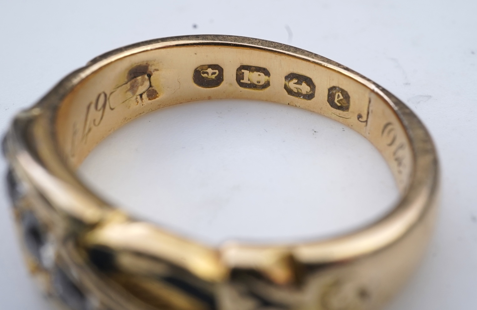 A Victorian enamel and diamond mourning ring, circa 1872